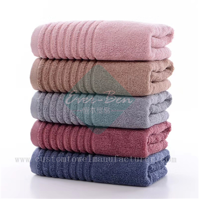 China Bulk Custom folded hand towel Factory Bespoke Logo Color Full Bamboo Bath Towels Producer